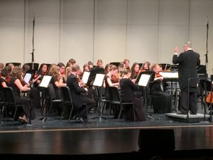 Mr. Hansen conducting his orchestra.