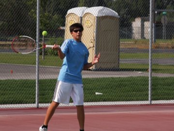 Duque Tennis Program teaches groups and individuals.