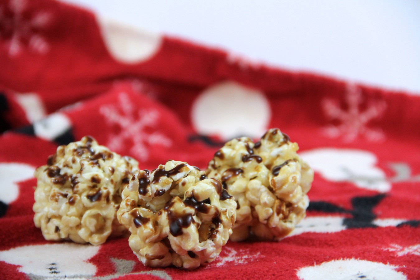 Peanut Butter and Nutella Popcorn Balls make for surprisingly healthy Christmas treats.