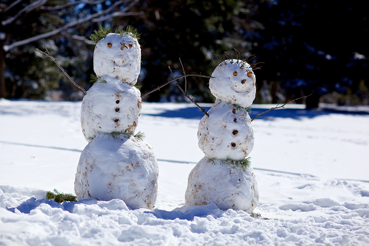 Building snowmen and women make for fun winter date ideas.