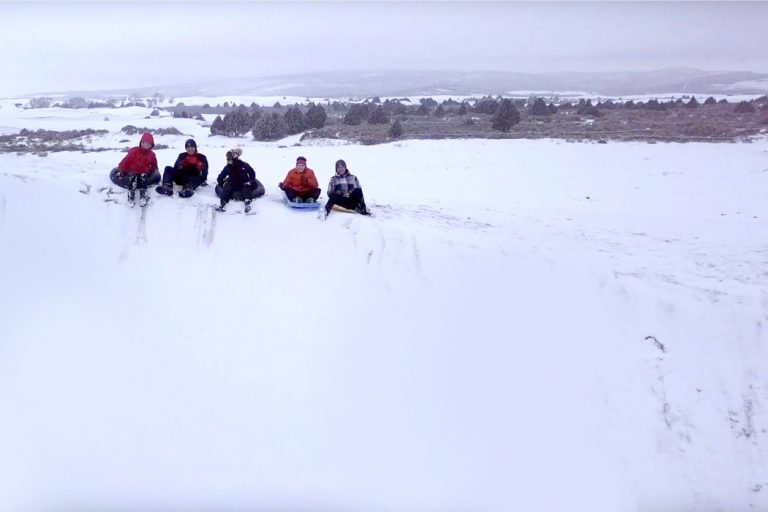 Sledding at the St. Anthony Sand Dunes is legit.