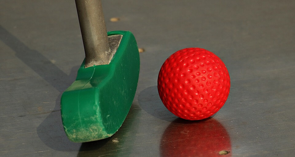 mini golf on campus is one of the good indoor date ideas