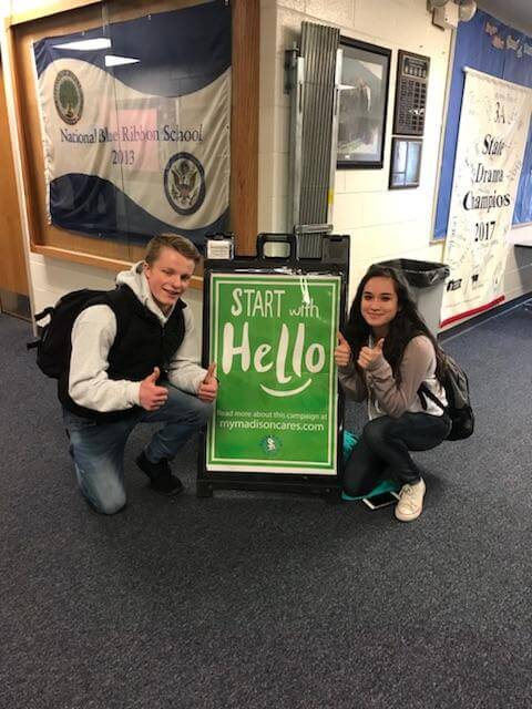 Luke Purser with student, kindness campaign