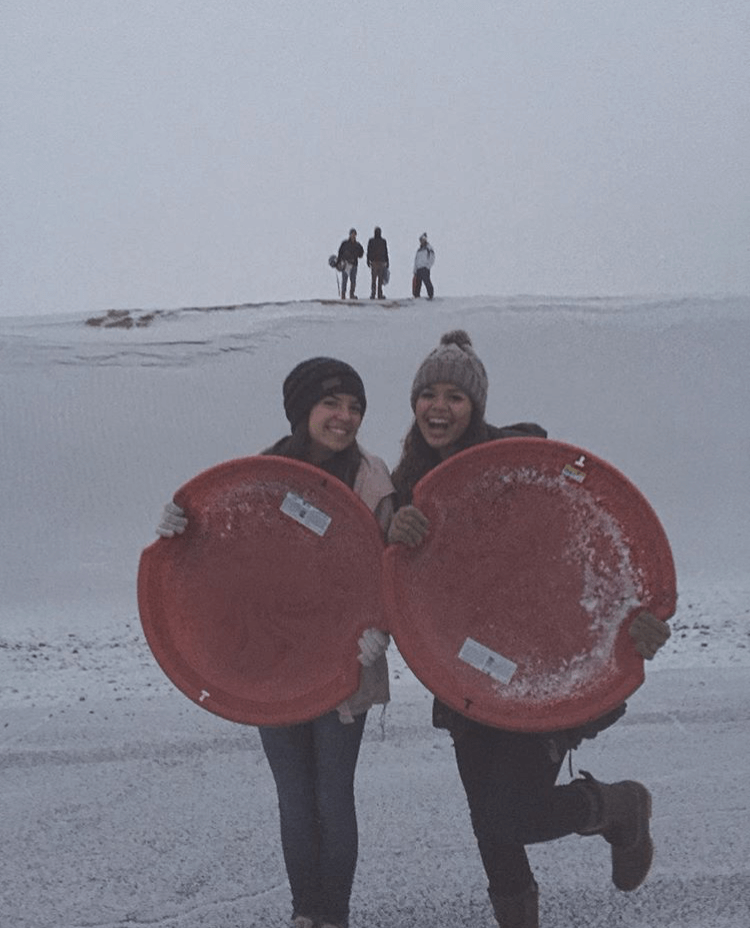 Sledding at St. Anthony sand dunes